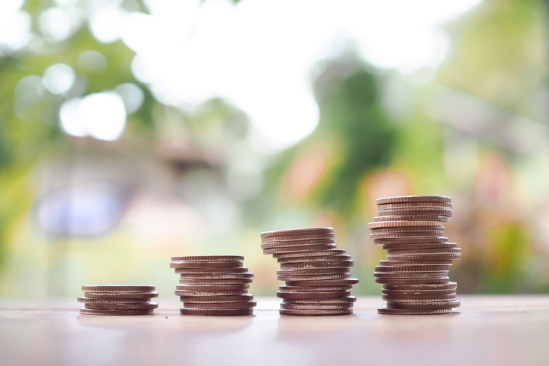 1920-close-up-stack-of-coins-the-concept-of-saving-money-financial-investment-and-business-growing
