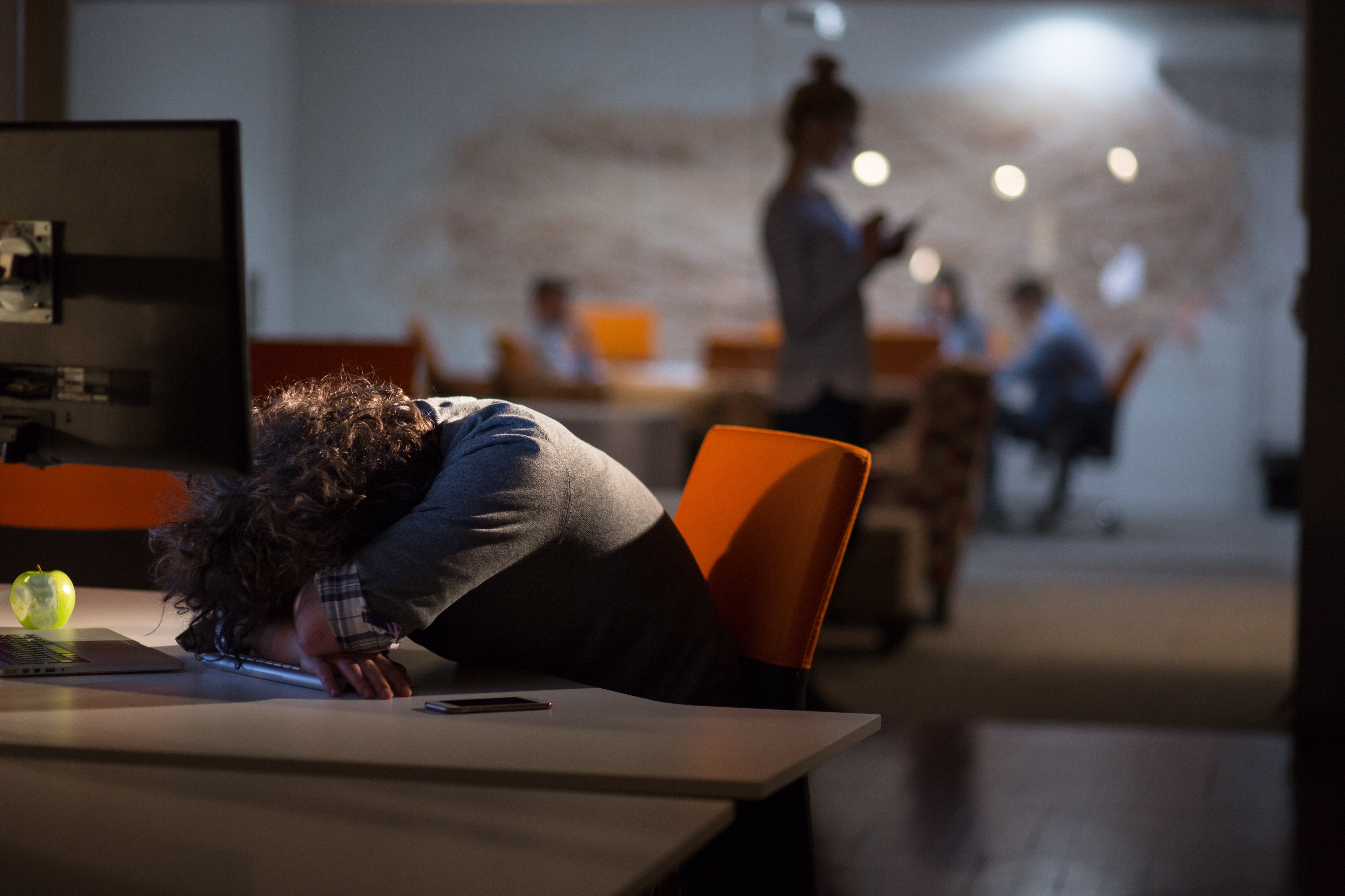 vecteezy_businessman-relaxing-at-the-desk_12443223